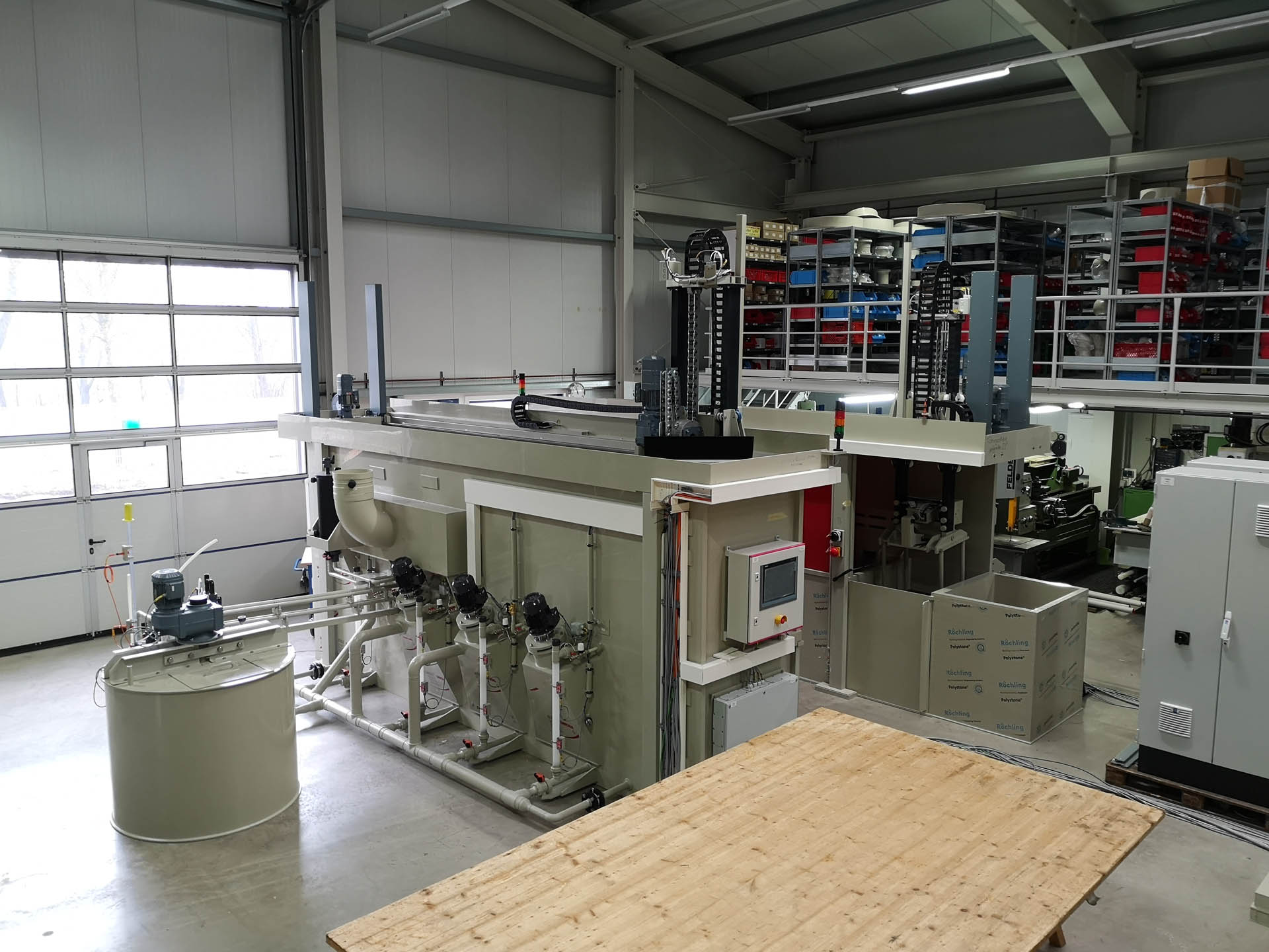 Thermoplastic acid polishing system for glass by Neutra in production hall